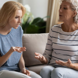 Woman arguing with her adult child who makes poor life decisions